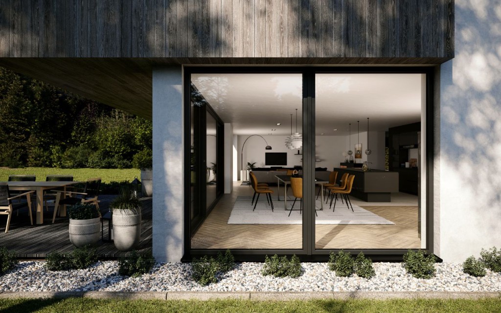Casa moderna con ventanas de PVC de grandes dimensiones y patio exterior